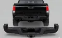 Bumper Trasero Completo para Toyota Tacoma 2016-2023 - Negro Mate Texturizado.